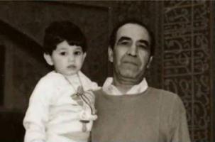 احسان خواجه امیریدر کودکی در آغوش پدر /عکس